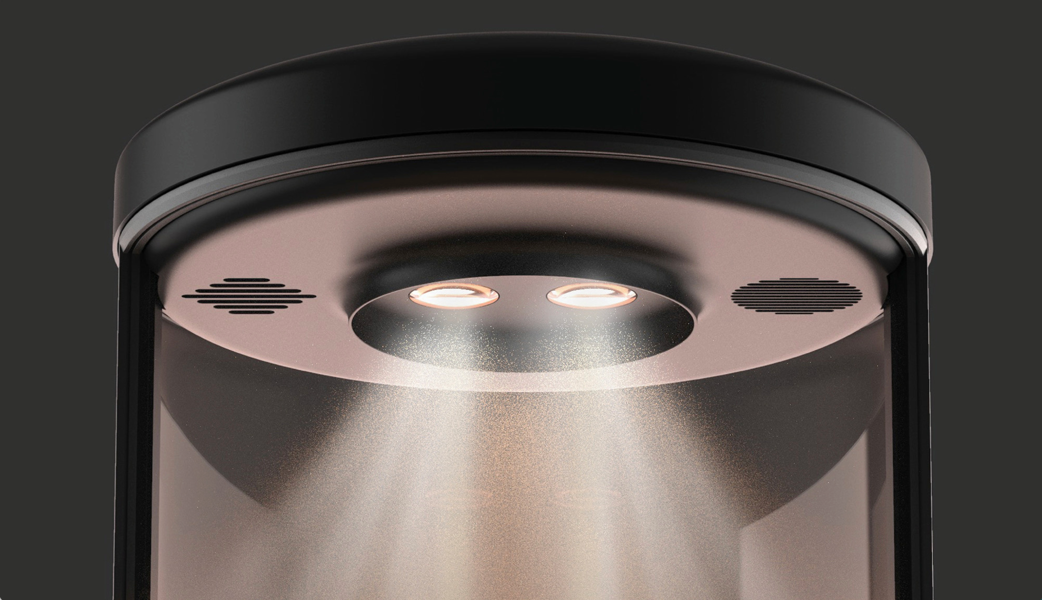 Glowing lights illuminating mist inside a dark enclosure